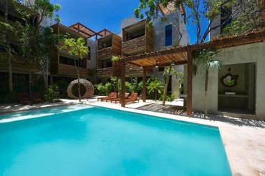 Eco-sustainable Luxury Between Beach Hotspots & Tulum Town by Moskito