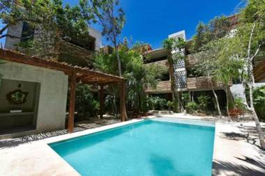 Eco-sustainable Luxury Between Beach Hotspots & Tulum Town by Moskito