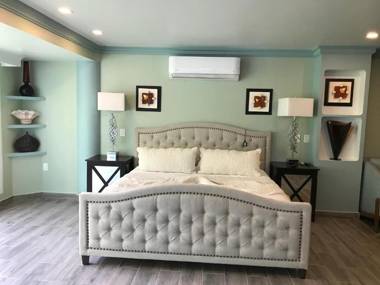 Room in Guest room - Private Suite with garden swimming pool and ocean views