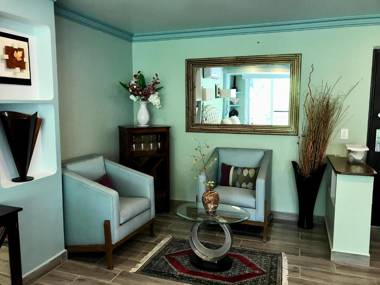Room in Guest room - Private Suite with garden swimming pool and ocean views