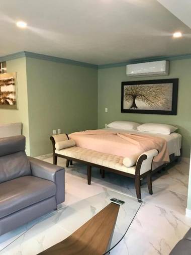 Room in Guest room - Beautiful suite with a full kitchen with amazing views of the beach and forest