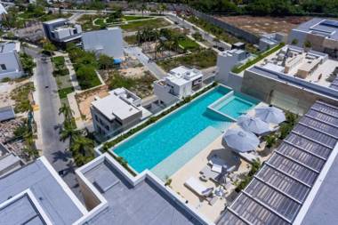 Exclusive apartment- Rooftop pool -near the beach