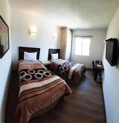 HOTEL 9 MANANTIALES EXPRESS