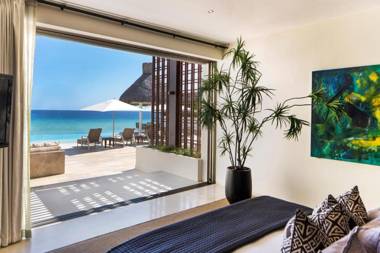 Ultra Exclusive Beachfront Villa Just Steps from the Sand with Butler Included