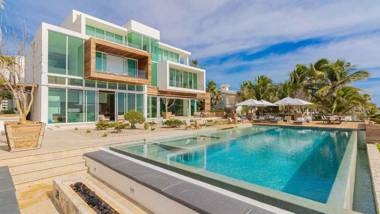Ultra Modern Beachfront Villa with Full Staff