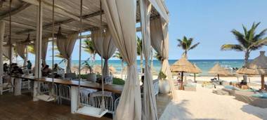 Tao condo in Tulum Country Club-Bahia Principe screened corner balcony beach and golf club access