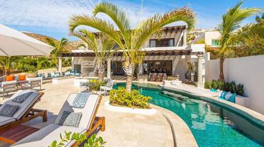 Spectacular 3-Story Beachfront Villa with a Huge Pool Patio