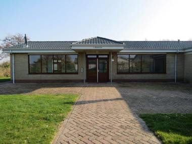 Tidy house with fireplace near North Sea beach