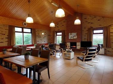 Tidy house with fireplace near North Sea beach
