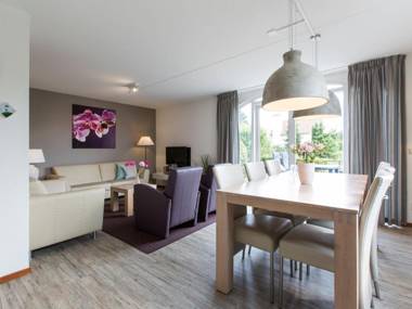 Luxurious villa with washer and dishwasher in a green area