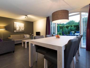 Luxurious villa with washer and dishwasher in a green area