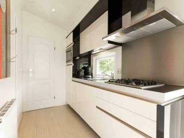 Well furnished chalet with garden in a water-rich area