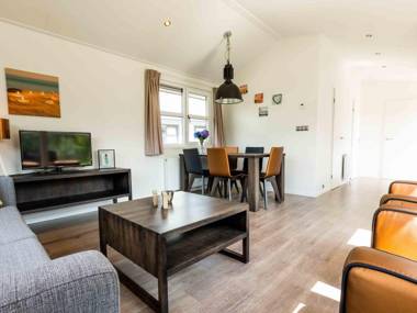 Modern chalet with combi-microwave in a water-rich area