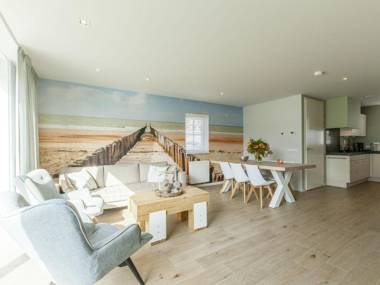 New and luxurious villa a 5-minute walk from beach and dunes.