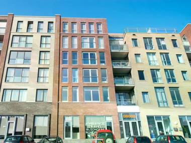 Modern apartment balcony overlooking exclusive seaworthy yachts