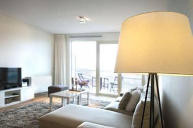 Modern apartment balcony with a view of the Dutch Olympic Sailing Association