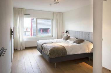 Modern apartment balcony with a view of the Dutch Olympic Sailing Association