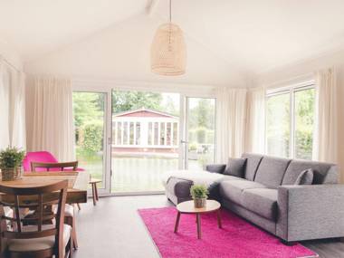 Enticing chalet with a dishwasher directly on a pond