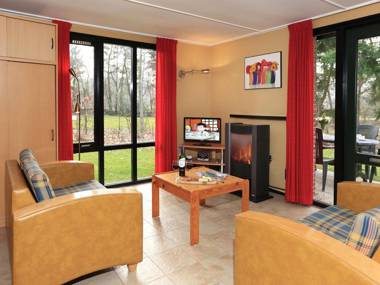 Nicely furnished bungalow with a gas fireplace in nature