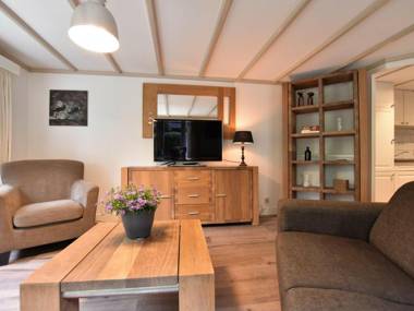 Pleasant chalet with a beautiful private garden featuring two terraces
