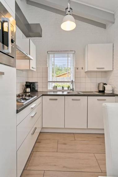 Bungalow Toekomst 24 Ouddorp garden fireplace near the beach and dunes - not for companies