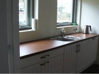 Restored back building of a farm.