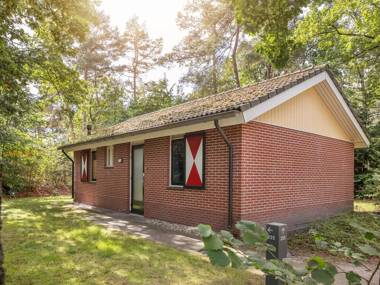 Engaging chalet with dishwasher next to a nature reserve