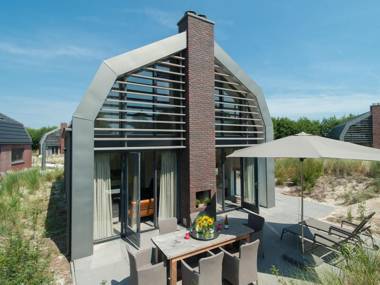 Beautiful new villa with sauna surrounded by dune reserve near the sea