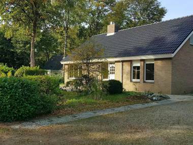 Nice holiday home with fireplace located in nature
