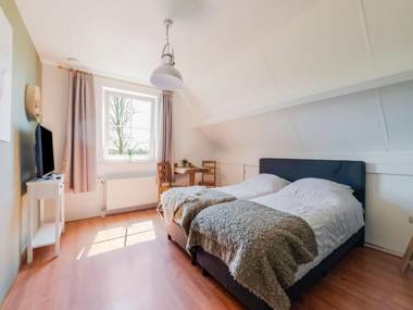 Pretty Farmhouse in Genderen with Terrace and Garden