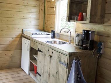 Cozy tentlodge with roofed terrace in a green area
