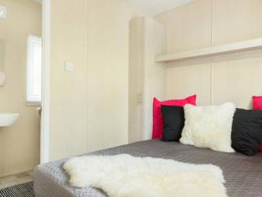 Cozy chalet with a decorative fireplace at nature reserve