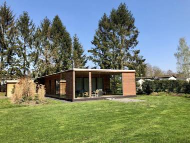 Modern lodge with a wood burning stove near Almelo