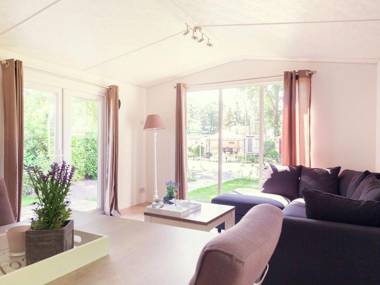 Comfortable chalet with a garden at nature reserve