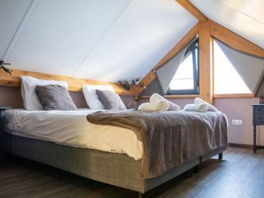 Classy Holiday Home in Alphen with Garden and Stables