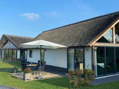 Pleasing Holiday Home in Alphen with Garden and Patio