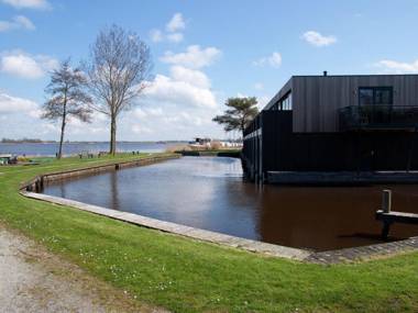 Charming Apartment in Langweer with Jetty