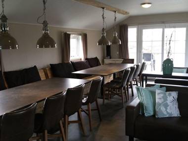 Combined chalets with a bathroom located near a pond