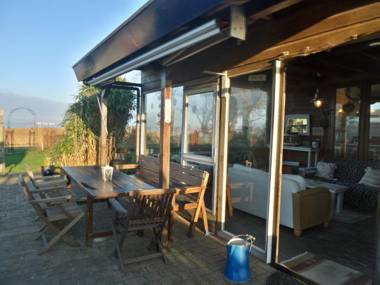 House Marijke with winter garden and direct access to the Lauwersmeer