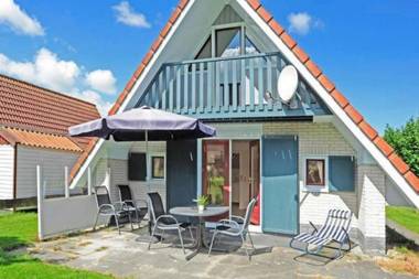 Lilian Modern Holiday home at a typical dutch canal close to the Lauwersmeer