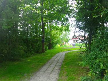 Sonnenhaus 6 pers house with sunny terrace at a typical dutch canal & by Lauwersmeer lake.