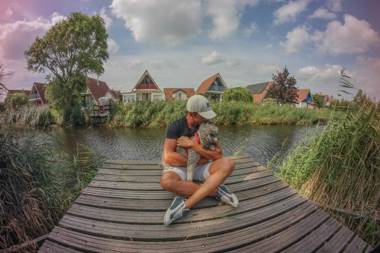 Sonnenhaus 6 pers house with sunny terrace at a typical dutch canal & by Lauwersmeer lake.