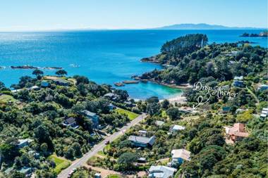 Drop Anchor at Enclosure Bay Beach by Waiheke Unlimited