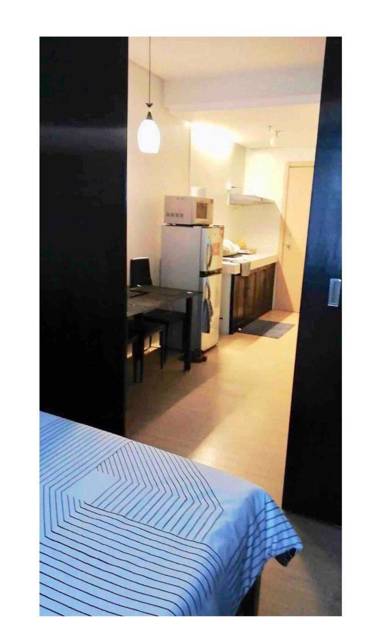 Shaz’s Mplace South Triangle Charming Condo Unit