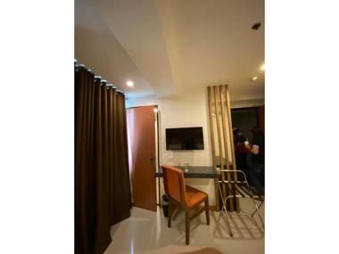 Vaccinated Staff - Capital O 820 Guijo Suites Makati