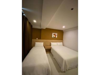 Vaccinated Staff - Capital O 820 Guijo Suites Makati