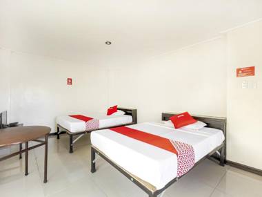 Vaccinated Staff - OYO 842 City Smiles Apartelle