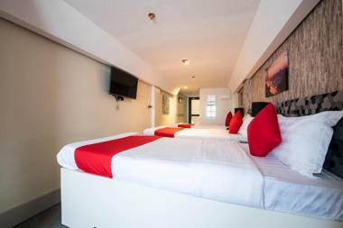 Vaccinated Staff - Capital O 492 Sunset View Ridge Residences