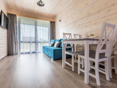 Comfortable apartment in a wooden cabin by the sea in Krynica Morska