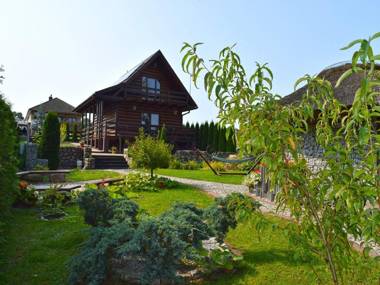 A luxury home on the shore of the lake. Living room with fireplace 2 bedrooms.